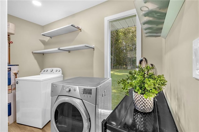 288 Valerie Cir, Hiram, GA 30141 - washroom featuring washing machine and clothes dryer and electric water heater