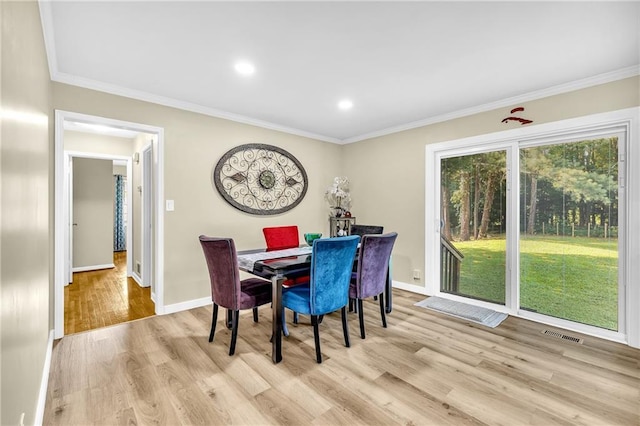 288 Valerie Cir, Hiram, GA 30141 - dining space with wood finished floors, ornamental molding, and recessed lighting