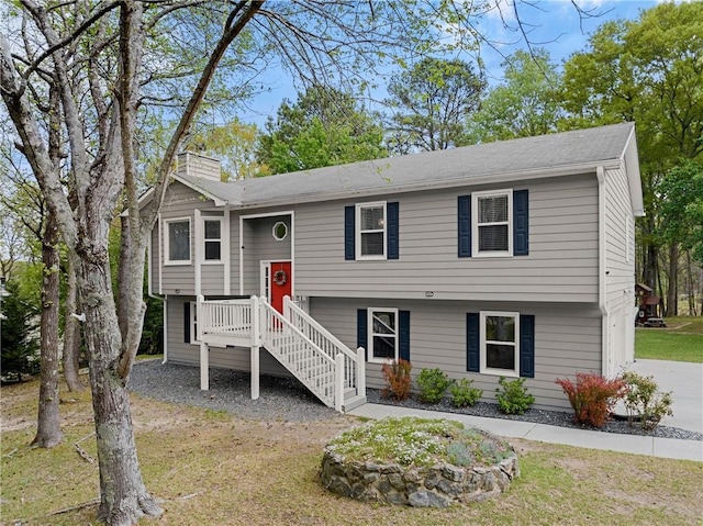 split foyer home with a chimney