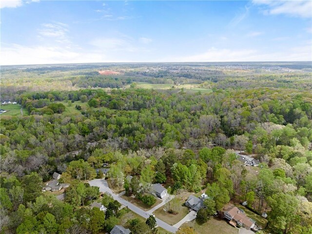 drone / aerial view with a forest view