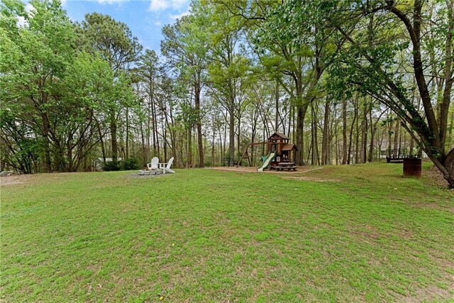 view of yard with a playground