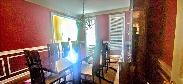 dining area with a chandelier