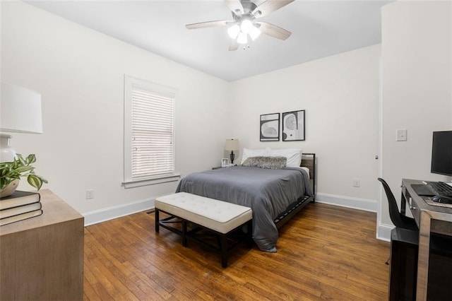 bedroom featuring dark wood-type flooring and ceiling fan