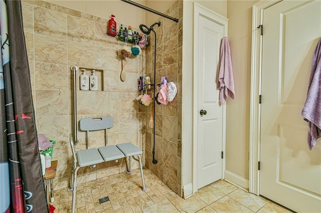 bathroom featuring tiled shower