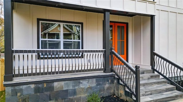 doorway to property featuring a porch