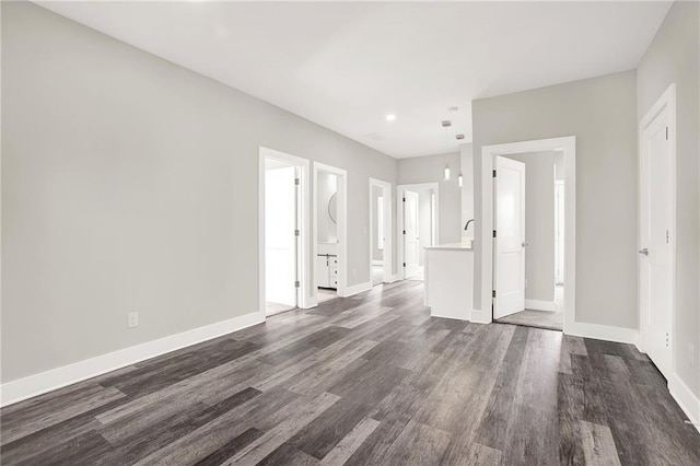 interior space with dark hardwood / wood-style flooring