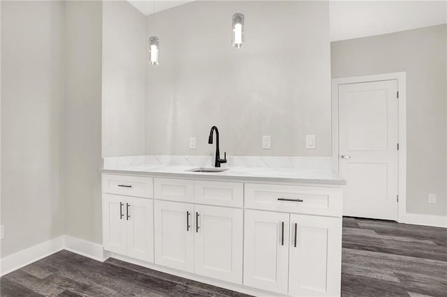 bathroom with vanity and wood-type flooring