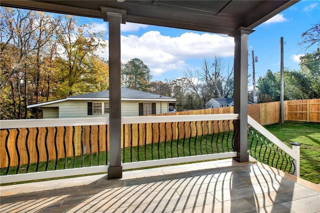 deck featuring a lawn