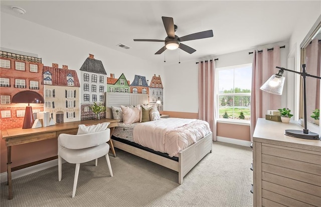 bedroom featuring ceiling fan and light colored carpet