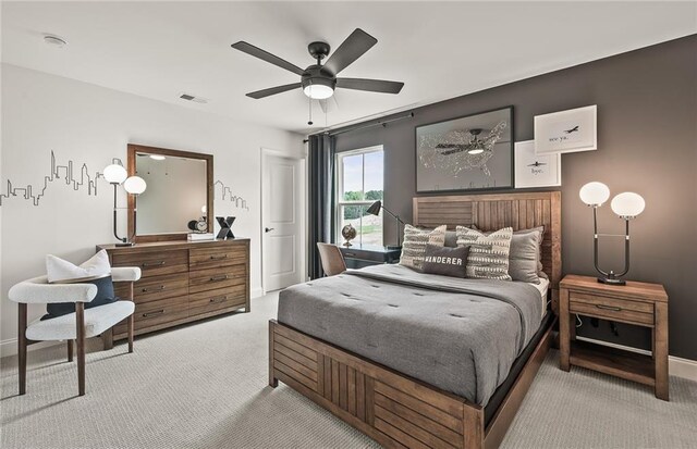 carpeted bedroom with ceiling fan