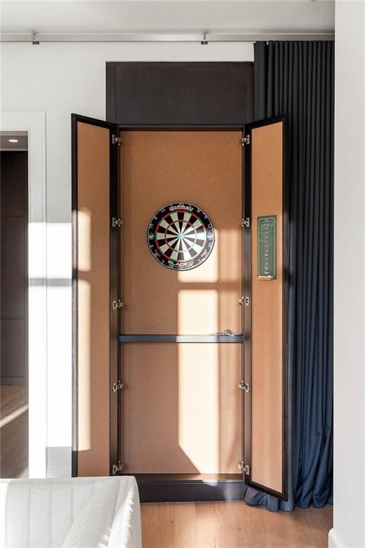 interior details featuring hardwood / wood-style floors