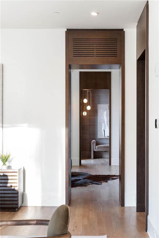 hallway featuring light hardwood / wood-style floors