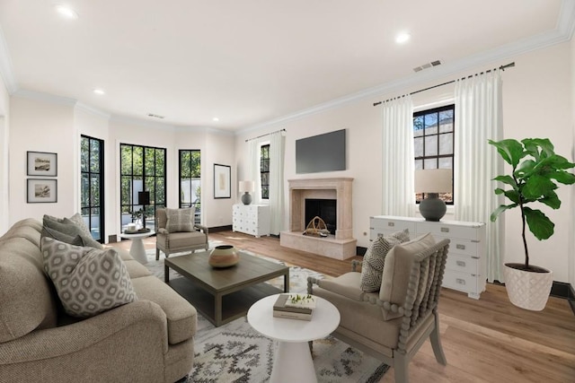 650 Moores Mill Rd NW Unit 1, Atlanta, GA 30327 - living area featuring light wood-style flooring, a premium fireplace, crown molding, and recessed lighting