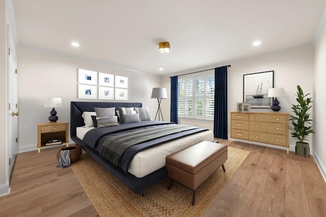 650 Moores Mill Rd NW Unit 1, Atlanta, GA 30327 - bedroom with light wood finished floors, recessed lighting, and crown molding