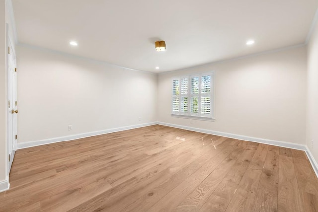 650 Moores Mill Rd NW Unit 1, Atlanta, GA 30327 - empty room featuring crown molding, light wood-style floors, and recessed lighting