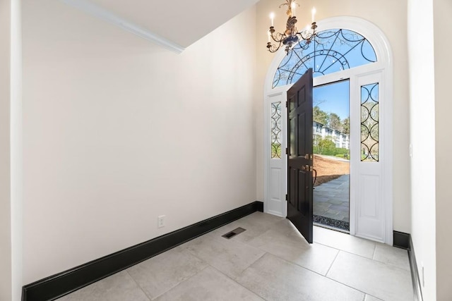 650 Moores Mill Rd NW Unit 1, Atlanta, GA 30327 - entrance foyer with a chandelier and baseboards