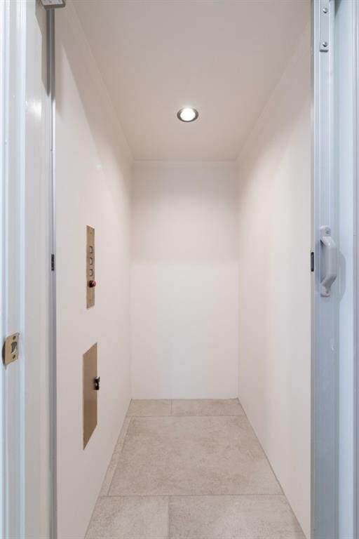 650 Moores Mill Rd NW Unit 1, Atlanta, GA 30327 - hall with elevator and recessed lighting