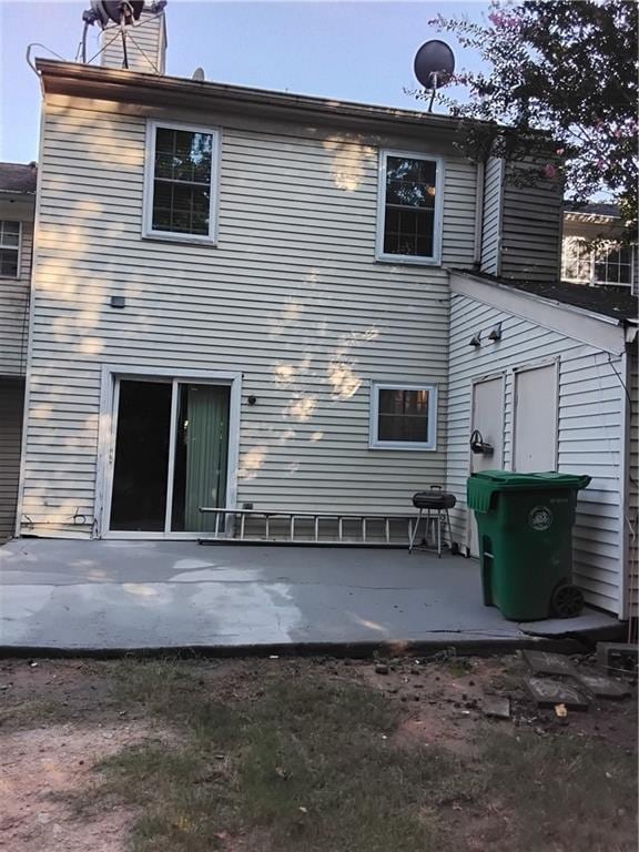 rear view of house featuring a patio area