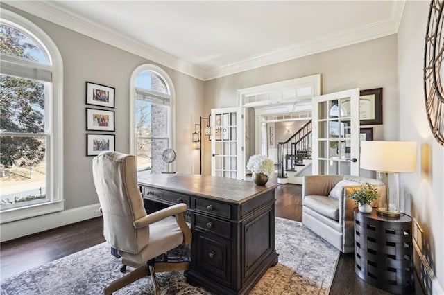 office area featuring french doors, plenty of natural light, and wood finished floors