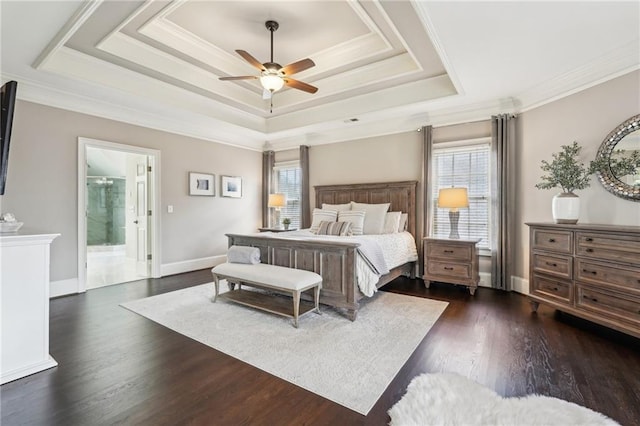 bedroom featuring multiple windows, a raised ceiling, dark wood finished floors, and ornamental molding