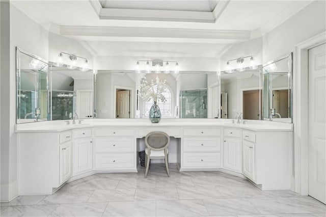 bathroom with vanity, crown molding, and marble finish floor