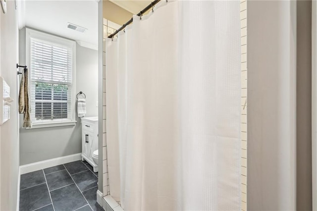 bathroom with visible vents, curtained shower, toilet, and tile patterned flooring