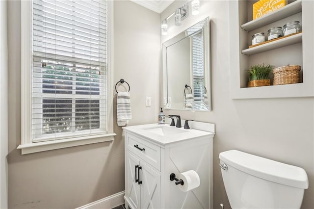 half bath with vanity and toilet