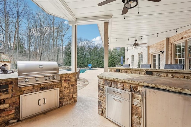 view of patio / terrace featuring grilling area, area for grilling, and a ceiling fan