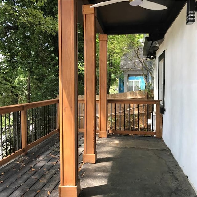 wooden deck with ceiling fan