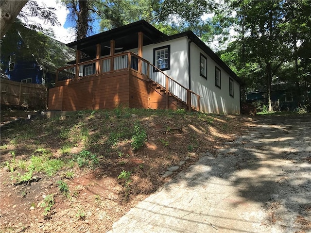 view of property exterior with stairs