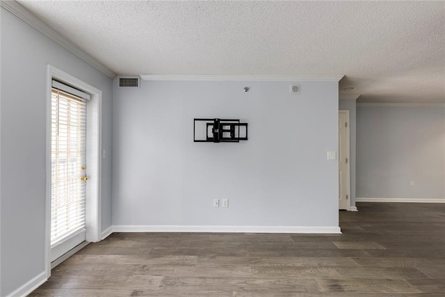 795 Hammond Dr Unit 503, Sandy Springs, GA 30328 - empty room with a textured ceiling, crown molding, and wood finished floors