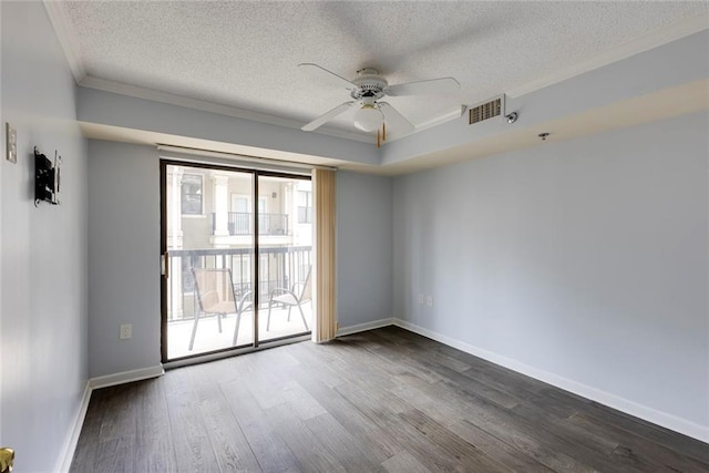 795 Hammond Dr Unit 503, Sandy Springs, GA 30328 - unfurnished room featuring ceiling fan, ornamental molding, a textured ceiling, and dark wood-type flooring
