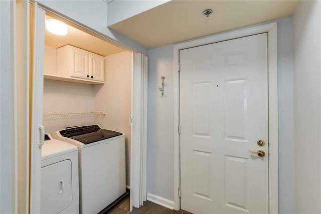 795 Hammond Dr Unit 503, Sandy Springs, GA 30328 - laundry room with washing machine and dryer, cabinet space, and dark wood finished floors