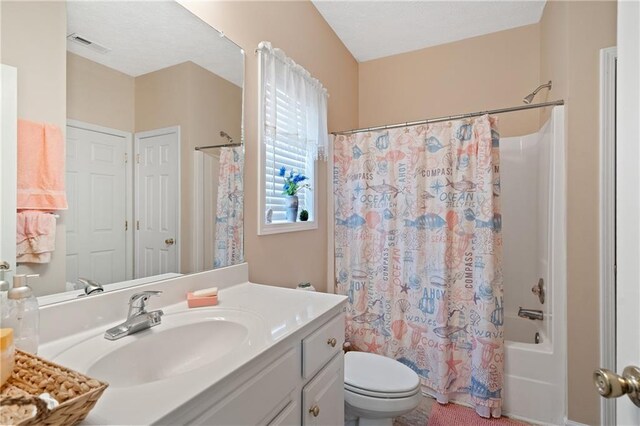 3734 Villa Springs Cir, Powder Springs, GA 30127 - bathroom featuring vanity, toilet, and shower / bath combo with shower curtain