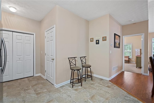 3734 Villa Springs Cir, Powder Springs, GA 30127 - foyer entrance with a textured ceiling and baseboards