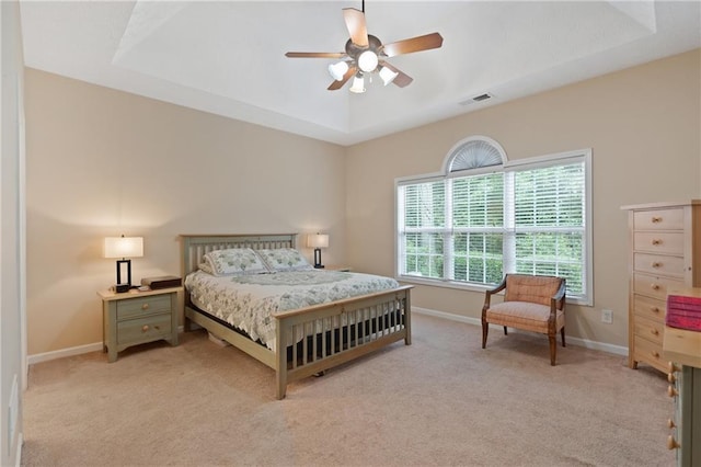 3734 Villa Springs Cir, Powder Springs, GA 30127 - bedroom featuring light colored carpet, baseboards, a raised ceiling, and a ceiling fan