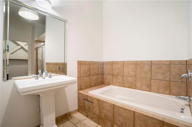 1596 Cleveland Ave Unit 301, East Point, GA 30344 - bathroom with a bath and tile patterned floors