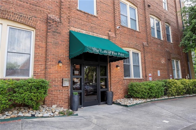 1596 Cleveland Ave Unit 301, East Point, GA 30344 - property entrance featuring brick siding