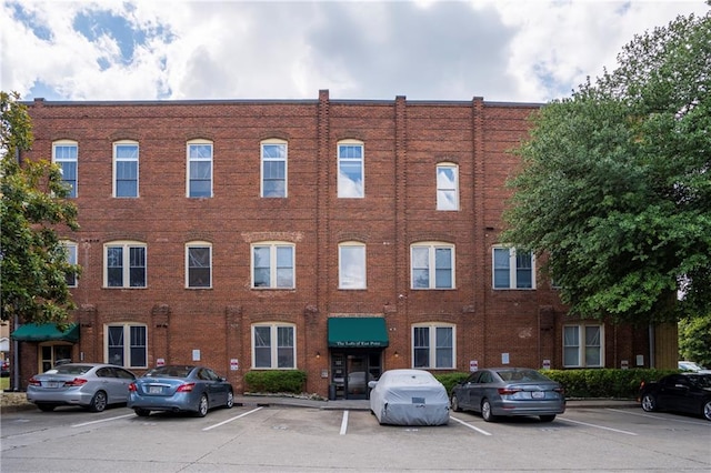 1596 Cleveland Ave Unit 301, East Point, GA 30344 - view of building exterior featuring uncovered parking