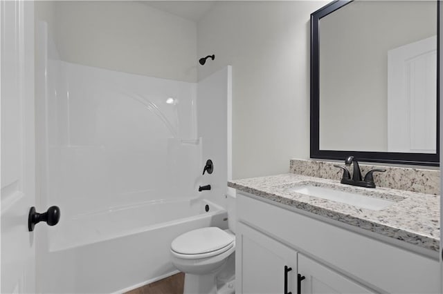 1687 Harmony Rd, Temple, GA 30179 - full bathroom featuring shower / bathtub combination, toilet, vanity, and wood finished floors