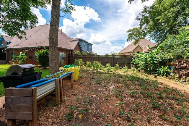 view of yard with fence