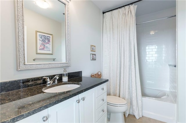 2795 Peachtree Rd NE Unit 1009, Atlanta, GA 30305 - full bathroom featuring toilet, vanity, shower / bath combo with shower curtain, and tile patterned floors