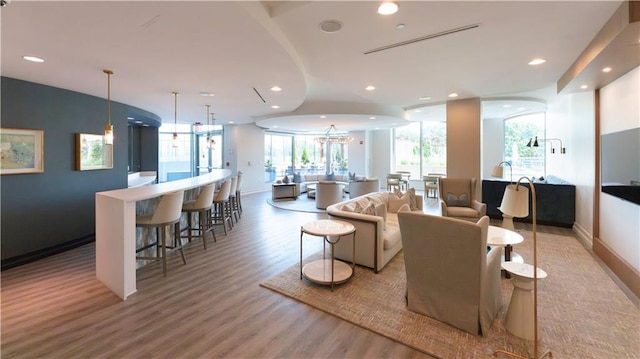 2795 Peachtree Rd NE Unit 1009, Atlanta, GA 30305 - living room featuring light wood-style floors, recessed lighting, and baseboards