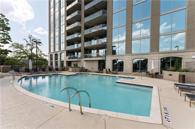 2795 Peachtree Rd NE Unit 1009, Atlanta, GA 30305 - community pool featuring a patio