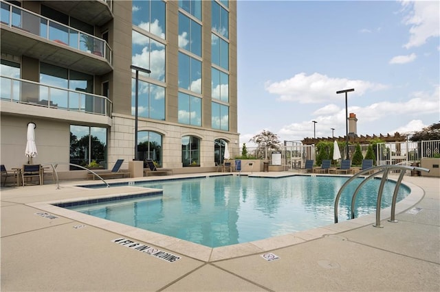 2795 Peachtree Rd NE Unit 1009, Atlanta, GA 30305 - community pool featuring a patio