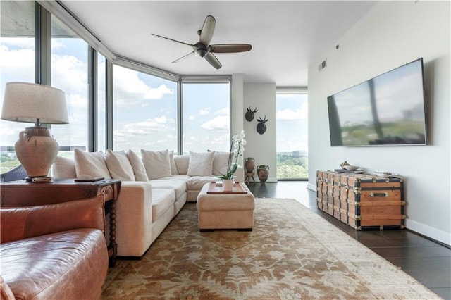 2795 Peachtree Rd NE Unit 1009, Atlanta, GA 30305 - living area featuring wood finished floors, a ceiling fan, and baseboards