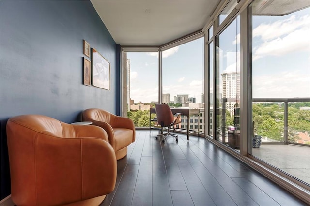 2795 Peachtree Rd NE Unit 1009, Atlanta, GA 30305 - sitting room featuring floor to ceiling windows, plenty of natural light, dark wood-type flooring, a view of city, and an office area