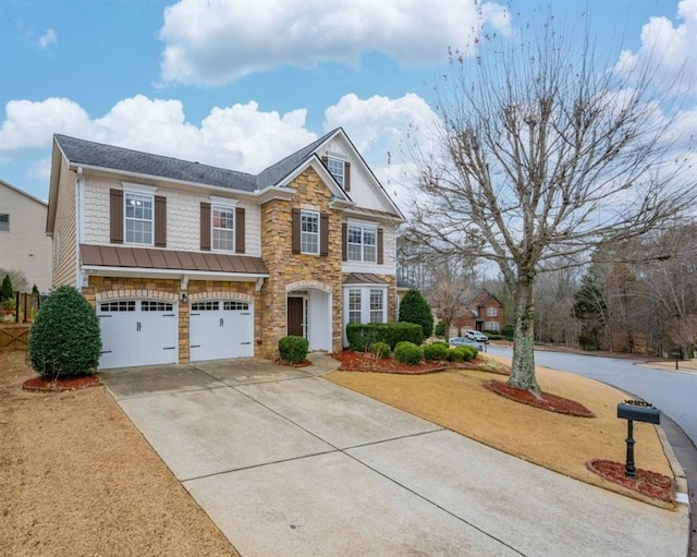 view of front of home with a garage