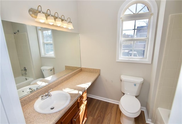 full bathroom with shower / bathtub combination, a wealth of natural light, and vanity