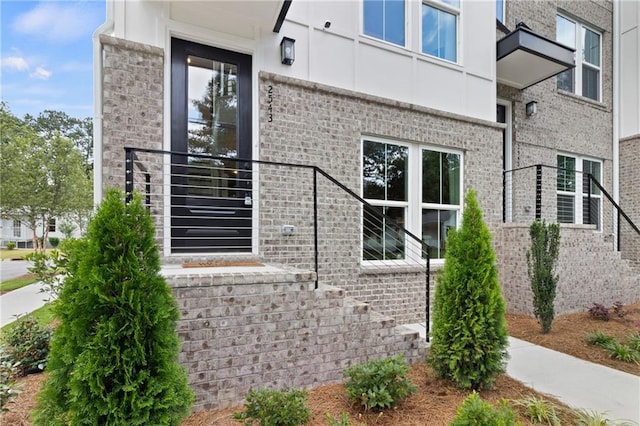 view of home's exterior featuring brick siding